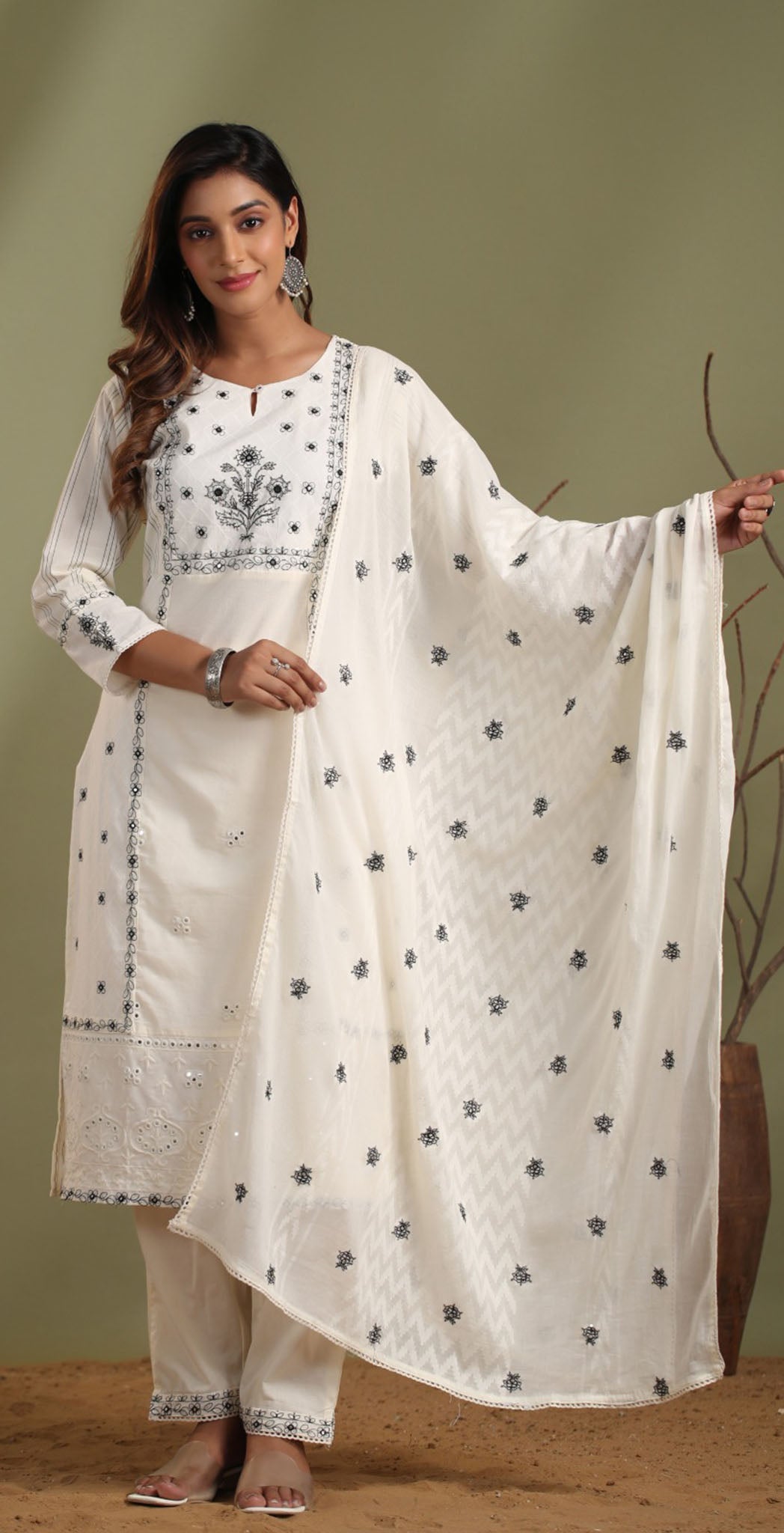 Off-white cotton embroidered salwar suit