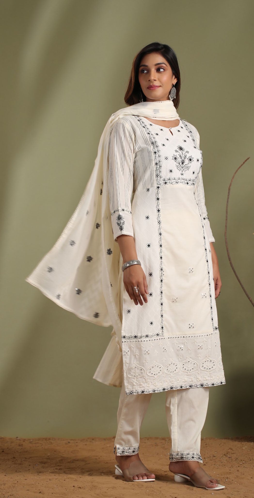 Off-white cotton embroidered salwar suit