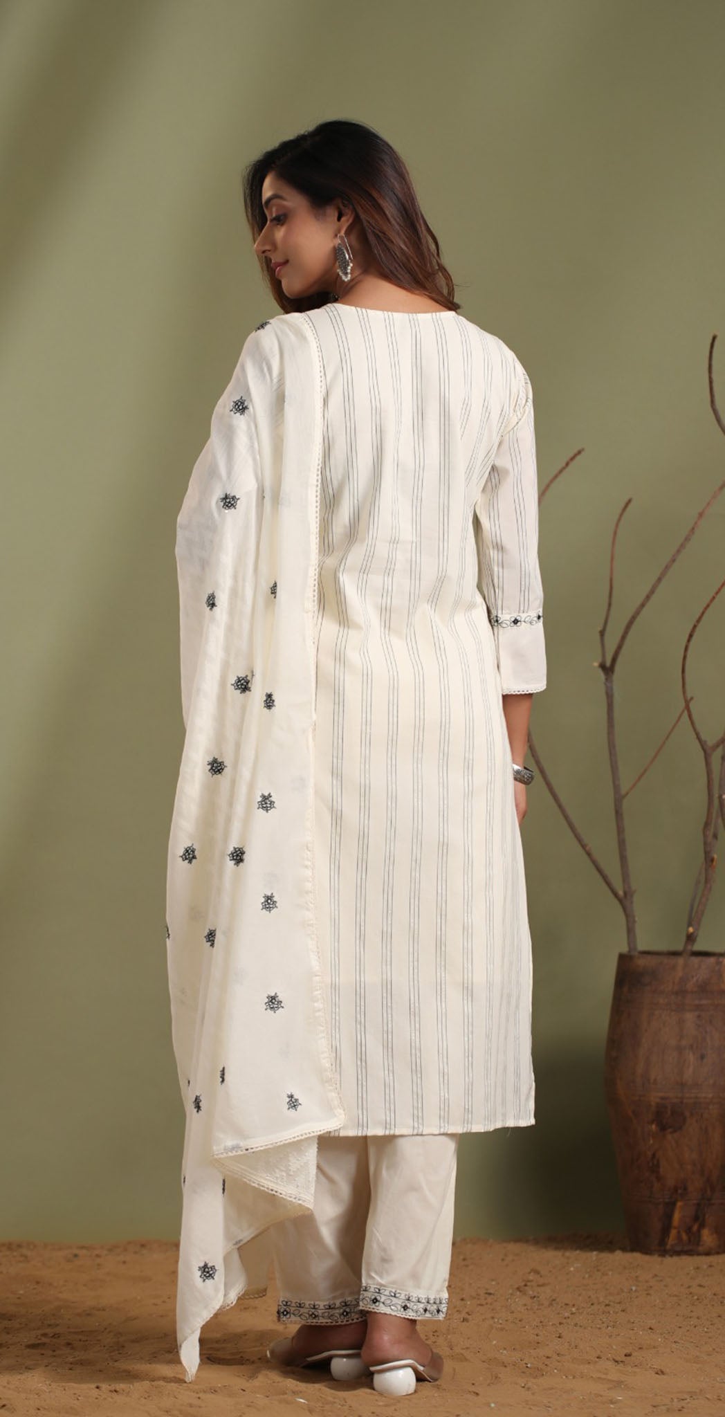 Off-white cotton embroidered salwar suit