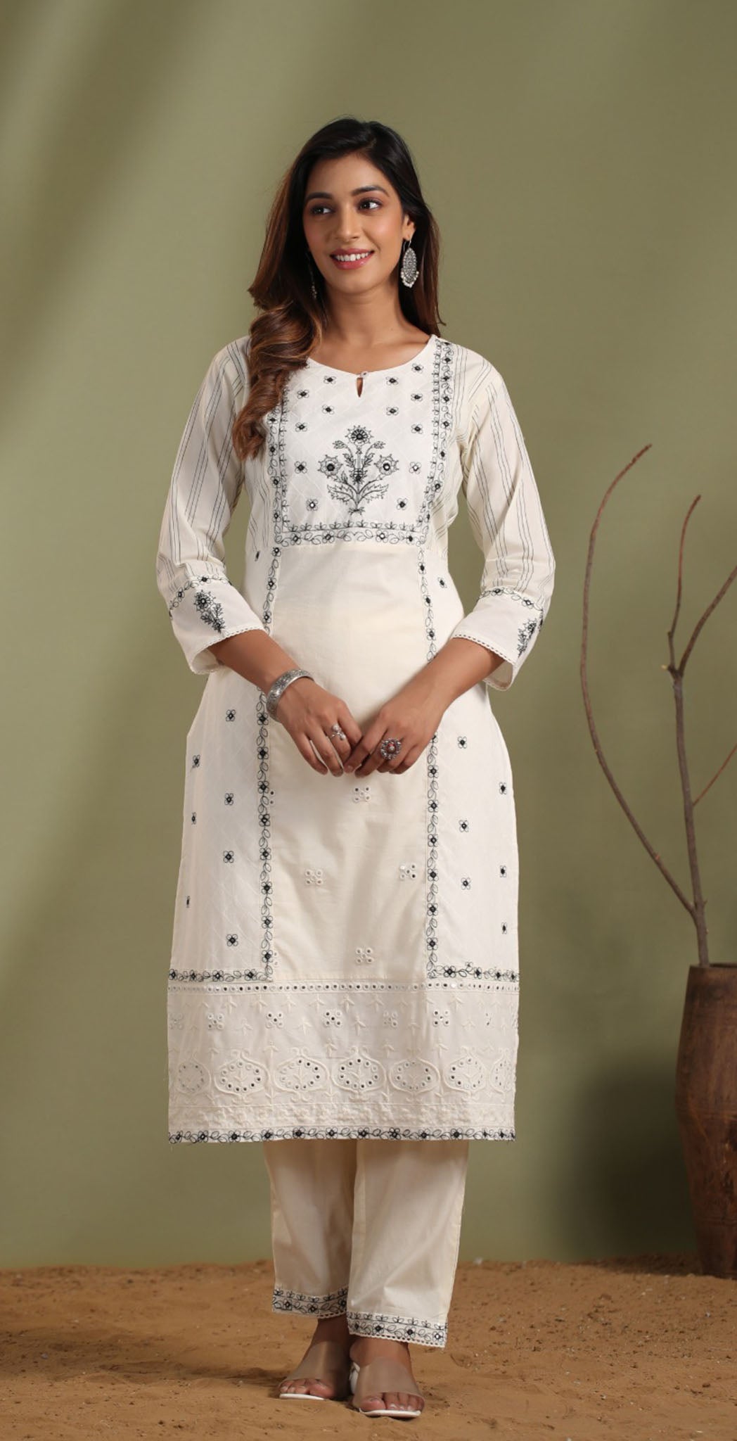 Off-white cotton embroidered salwar suit