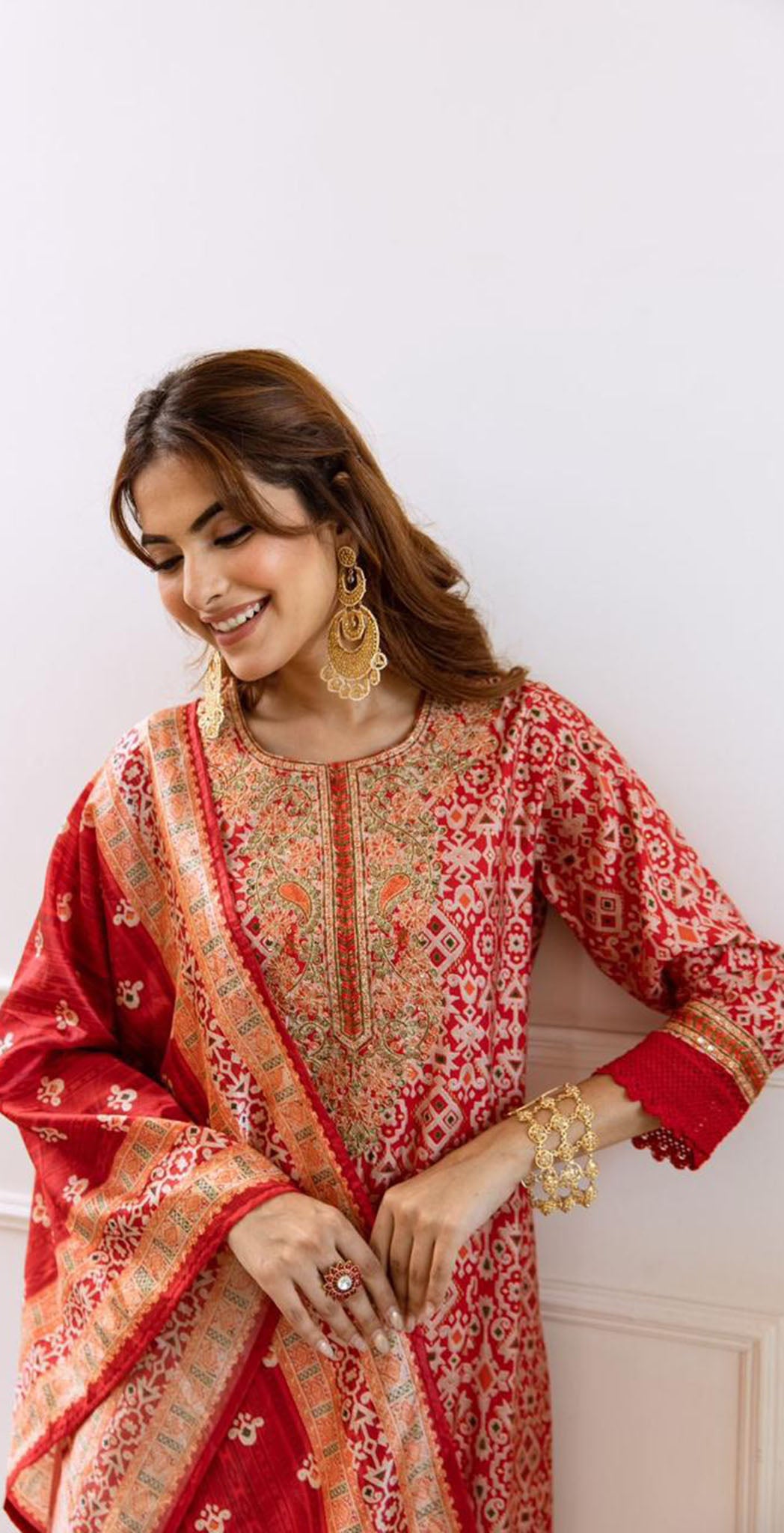 Red muslin printed and embroidered salwar set